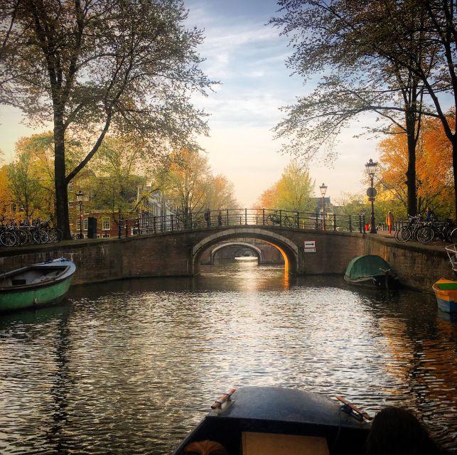 Amsterdam Small-Group Walking Tour - Starting at Beursplein 1: where modern Amsterdam meets old trade