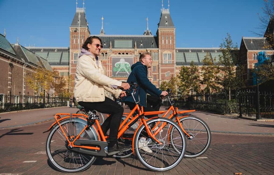 Amsterdam: Top Highlights Guided Bike Tour EN/DE/ES/FR/IT/CN - Photo Tips and Practical Things to Bring