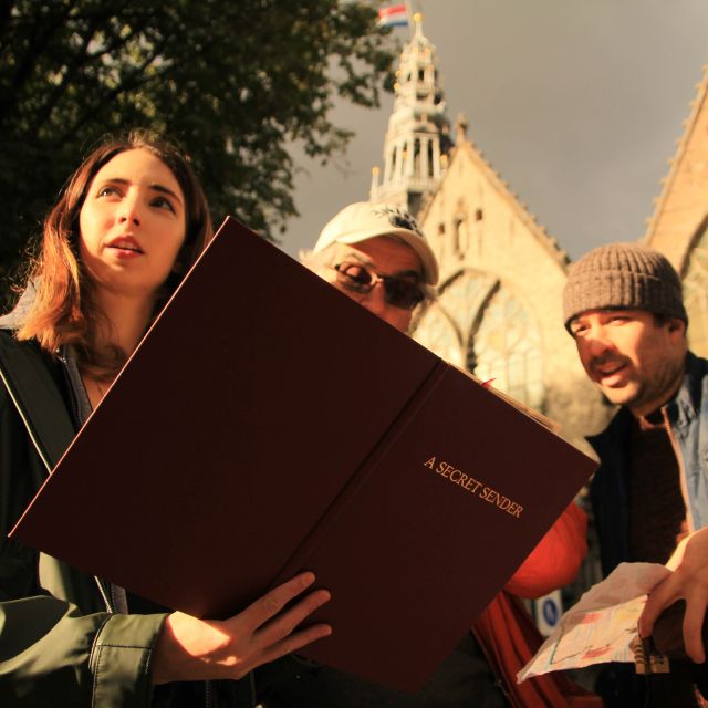 Amsterdam: Treasure Hunt Walking Tour "A Secret Sender" - Oude Kerk: a classic landmark with hands-on problem solving