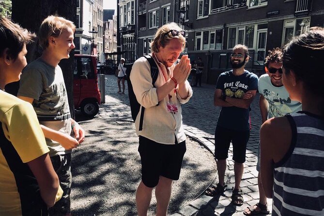 Amsterdam Walking Tour with a local comedian as guide - Meeting at Dam Square, then letting the city talk