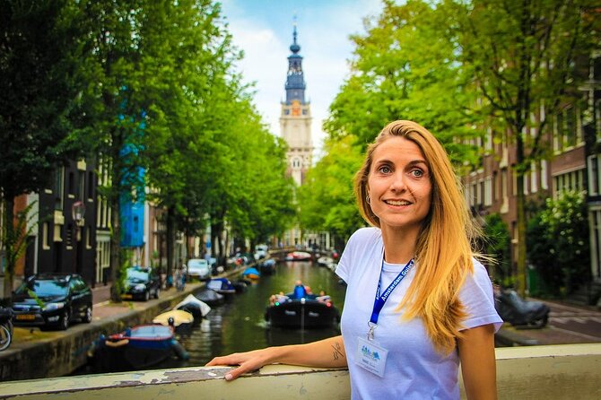 Amsterdam: Walking Tour with Dutch Pancake Lunch - Where you meet: Beursplein, Bistro Berlage, and the blue umbrella