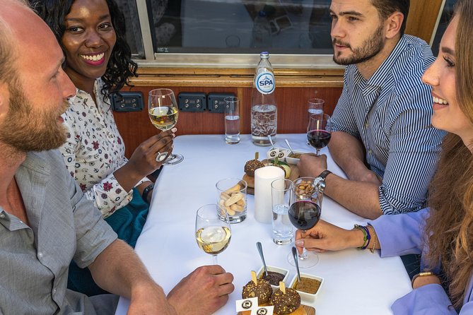 Amsterdam: Wine and Cheese Evening Cruise - Wine and Dutch cheese, served in an actually fun way