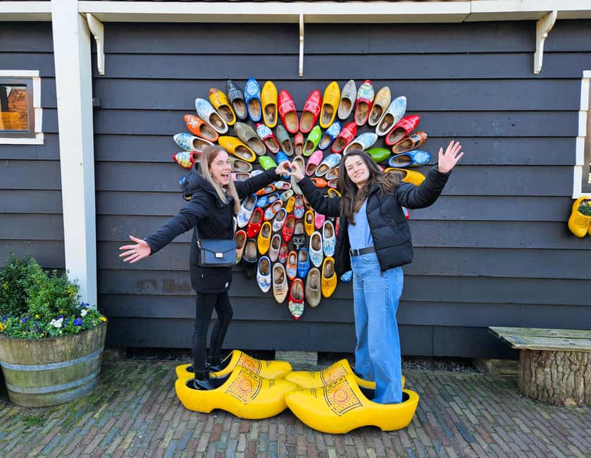Amsterdam: Zaanse Schans windmills & Volendam Guided Tour - The Amsterdam canal cruise voucher, if you chose the add-on