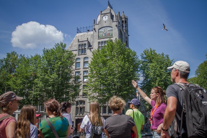 Anne Frank Private Bike Tour in Amsterdam - Spinoza Monument: a short pause that keeps the route grounded