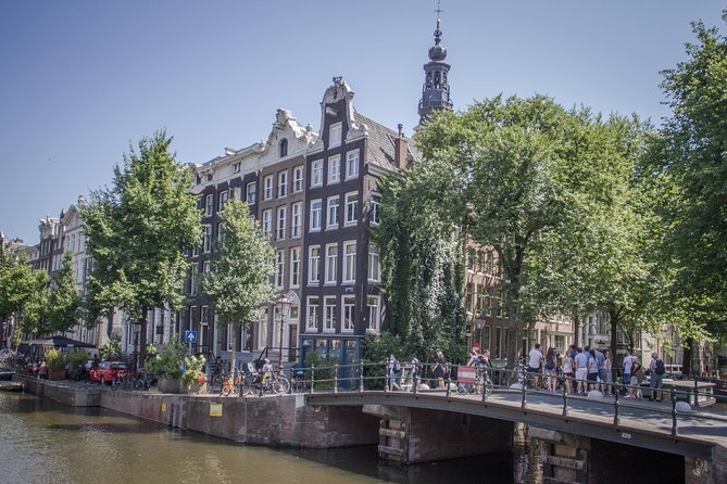 Anne Frank Private Bike Tour in Amsterdam - Passing the Dutch National Opera & Ballet without breaking your flow