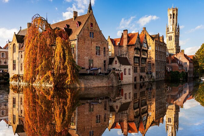 Charms of Brussels and Bruges Day Trip from Amsterdam - Brussels First: Atomium, UNESCO Central Square Area, and the Tintin Mural