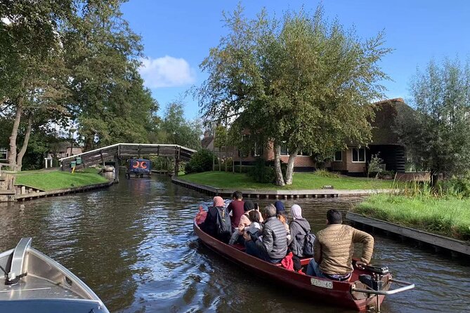 Day Tour Giethoorn, Afsluitdijk and Zaanse Schans with Boat Cruise - Getting out of Amsterdam: pickup, timing, and the real day length