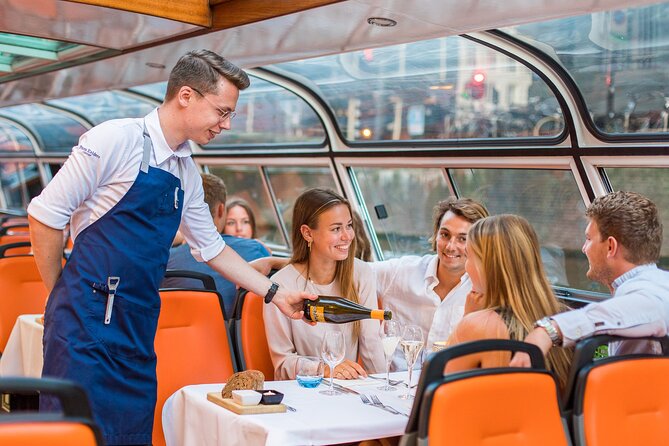 Dinner Canal Cruise Amsterdam: 4-Courses Including Drinks - Entering Prins Hendrikkade, Then Getting Down to Sunset Views