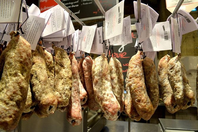 Discover Amsterdam's Culinary Scene: Morning Food Tour - What you eat: truffles, cured sausage, seafood, and stroopwafel