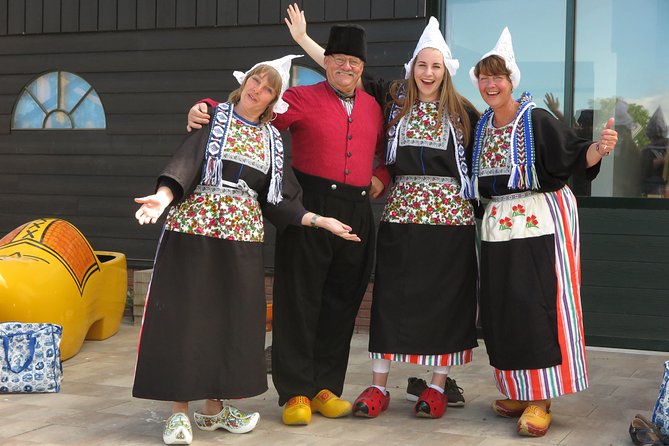 Dutch Experience in Volendam with Traditional Outfits - Simonehoeve in Traditional Dutch Costume, Clogs, and a Pro Group Photo