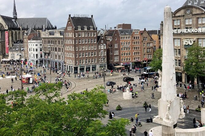 Dutch Golden Age: Private Tour of Amsterdam & Rembrandt's House - Stop 4: Dam Square and Damstraat, where landmarks do the talking