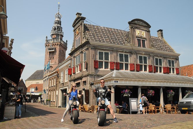 E-scooter rental Volendam - Countryside of Amsterdam - Monnickendam in an hour: bronze-brick streets, old harbour charm, and a beer brewery