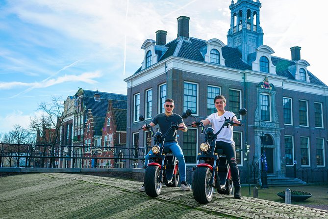 E-scooter rental Volendam - Countryside of Amsterdam - Extending to Marken: bridges, wooden façades, and the 10 km dike feel