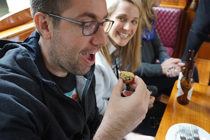 Eating Amsterdam: Food Tour & Canals Cruise - Vishandel Centrum: herring and kibbeling without the tourist script