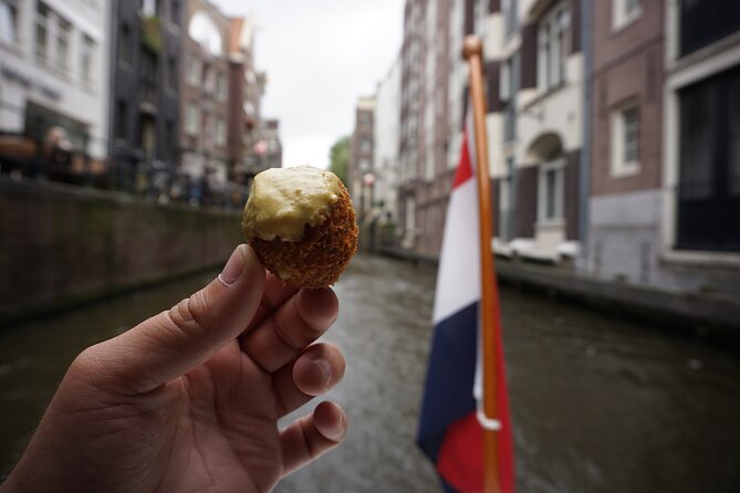 Eating Amsterdam: Food Tour & Canals Cruise - De Gangen Willemstraat and the WWII context you carry forward