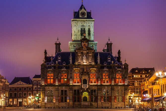 From Amsterdam: Day Trip to Rotterdam, Delft & Hague with Cruise - Delft canals, royal burial sites, and the Delft Blue factory demo