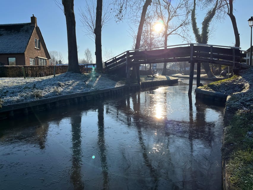 From Amsterdam: Giethoorn Small Group Tour with Boat Ride - Walking Giethoorn: bridges, stories, and flexible free time