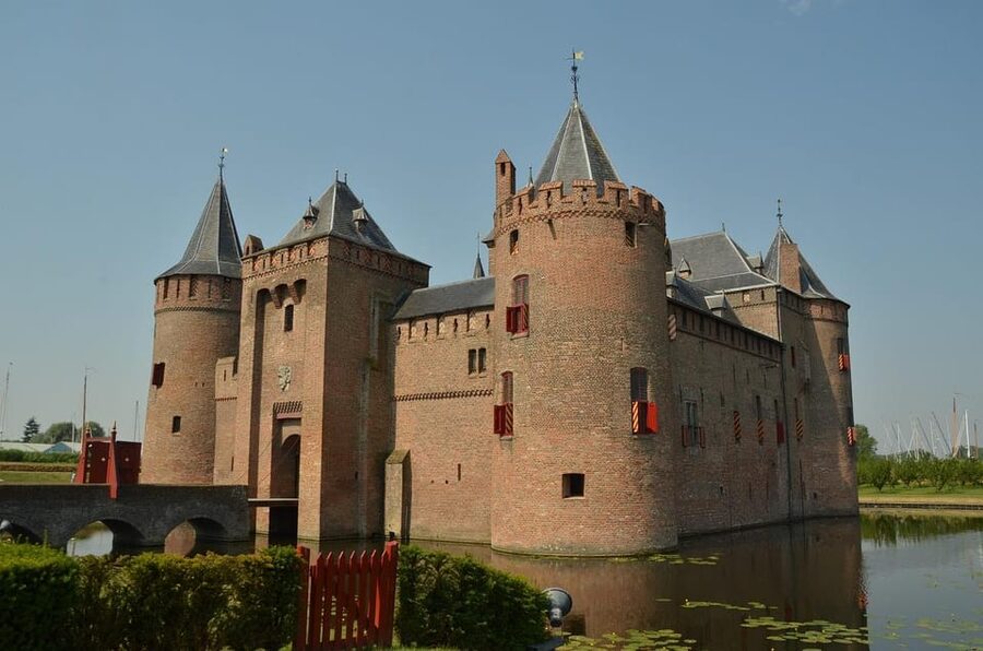From Amsterdam: Muiderslot and De Haar Castle Tour - Muiderslot Castle: A 13th-century Fortress With Medieval Atmosphere
