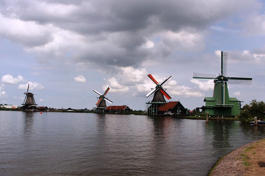 From Amsterdam: Windmills & Volendam Private Tour - Zaanse Schans windmills and the shop-filled village that does the classics right