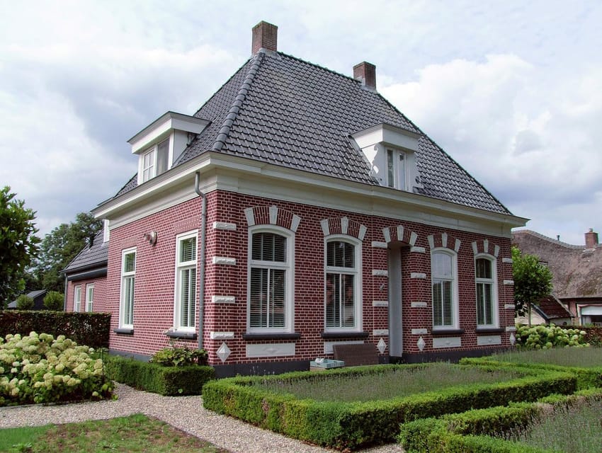 From Amsterdam: Zaanse Schans and Giethoorn Countryside Trip - Giethoorn: car-free canals, thatched cottages, and a boat tour