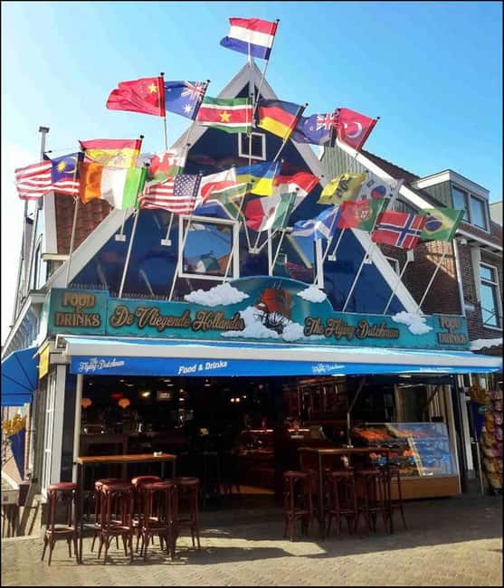 Full-day excursion to Edam, Volendam, and Marken - Marken: photo stops, churches, WWII monuments, and wooden shoes