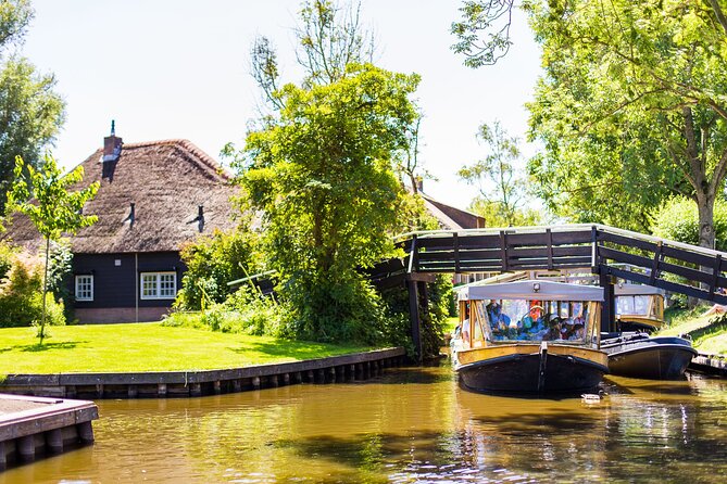 Giethoorn and Afsluitdijk Day Trip from Amsterdam with Boat Trip - Getting From Amsterdam: Coach Ride, Timing, and Comfort