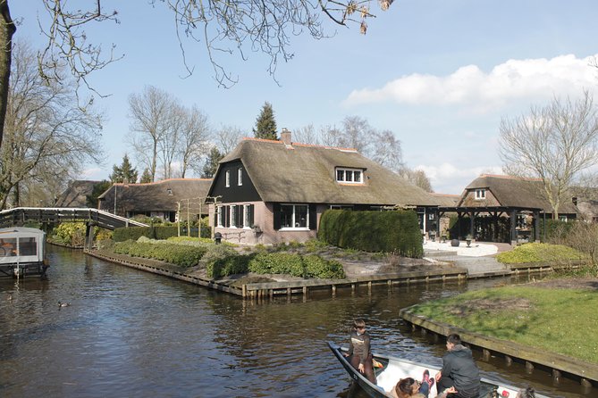 Giethoorn, Zaandam & Zaanse Schans Day Tour w/ Small Boat Ride - Giethoorn on a small electric boat, plus yes, you can steer