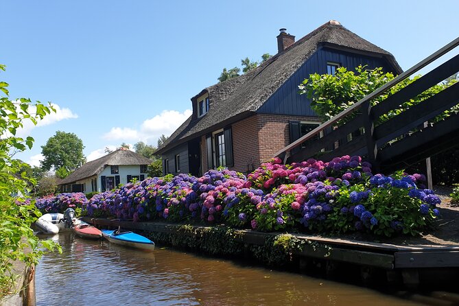 Giethoorn, Zaandam & Zaanse Schans Day Tour w/ Small Boat Ride - Zaanse Schans windmills and village vibes, plus the best factory stops