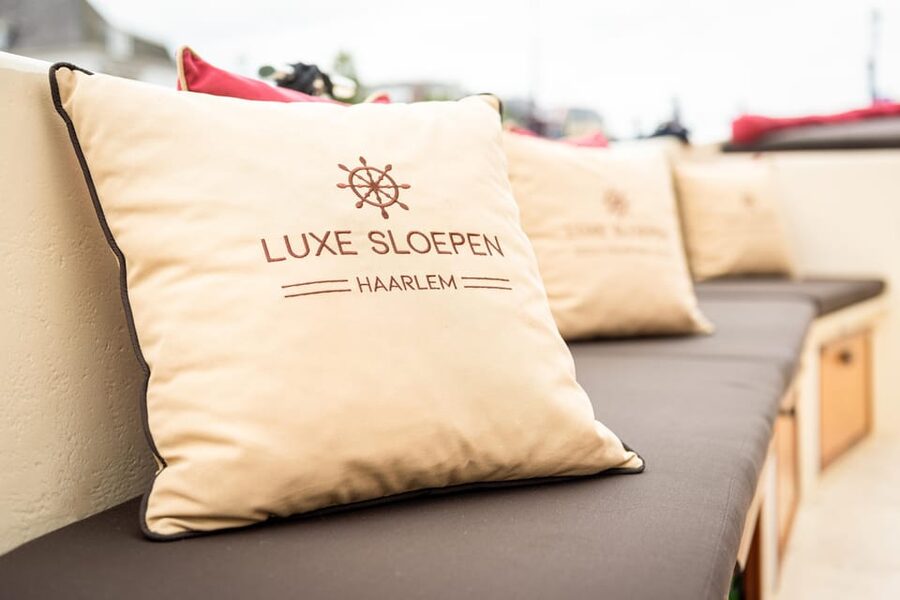 Haarlem: Guided Highlights Canal Cruise on Open Boat - Drinks, Snacks, Comfort Seats, and Bathroom Reality