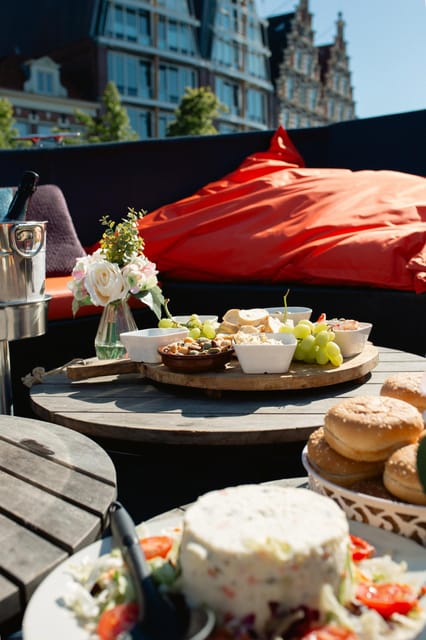 Haarlem Private Canal Tour with Bites and Unlimited Drinks - Unlimited drinks and fried bites: a fun combo that fits the vibe