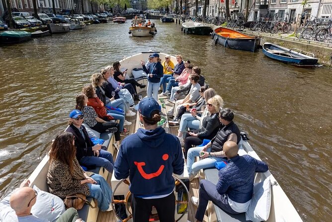Highlights and Local Insights Canal Cruise Tour in Amsterdam - Boat Reality Check: Electric Comfort, Removable Roof, and No Music