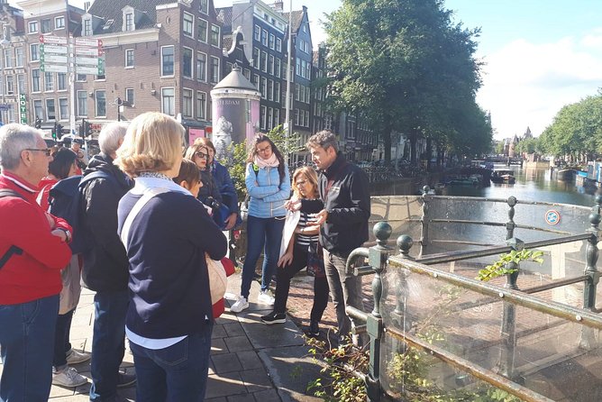 Historical tour of Amsterdam with Italian guide - Flower Market energy at the Residence stop