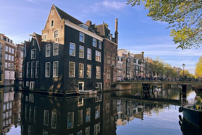 Historical Walking Tour, private with local Dutch guide - Stop 5, Het Kleinste Huis van Amsterdam: Tiny House, Big Symbols
