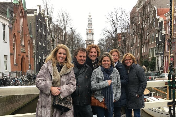 Holland Four City Charm Tour - Private Day Tour - Haarlem in 90 minutes: market square, courtyards, St. Bavo, and shopping breaks