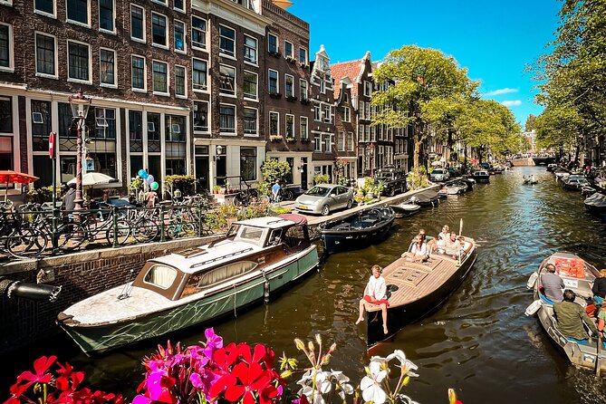 Humans of Amsterdam: Cultural Walking Tour incl. meeting 2 locals - De Wallen in Context: Rose’s Story and a Brothel View Through Video