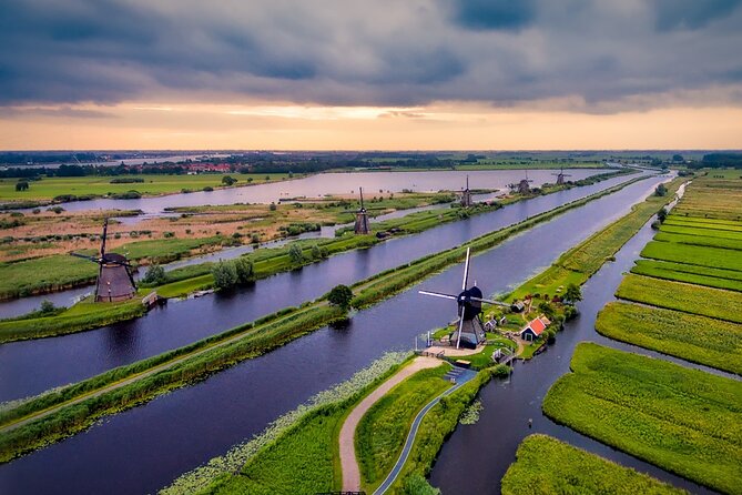 Kinderdijk Windmills and Delft Small-Group Tour from Amsterdam - The boat ride: the best way to slow down and see it differently