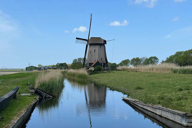 Kinderdijk Windmills, Delft City & Delft Blue Factory Visit - Delft Old Town Walk: Cobblestones, Canals, and Real Connections