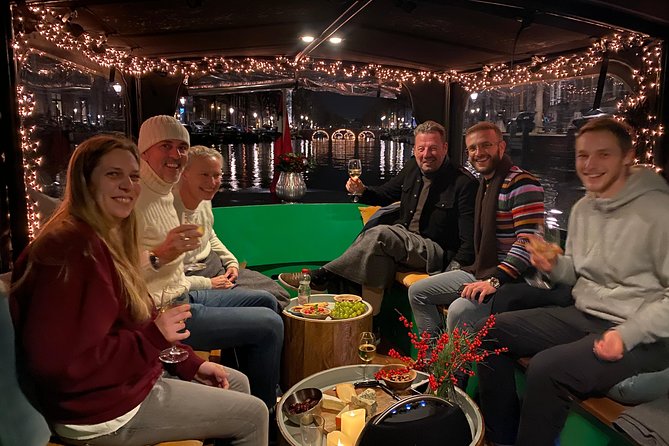 Light Event Amsterdam by small boat, 8 passengers max! You won't find any better - Captain Brian’s Live Commentary, Including Exhibit Explanations