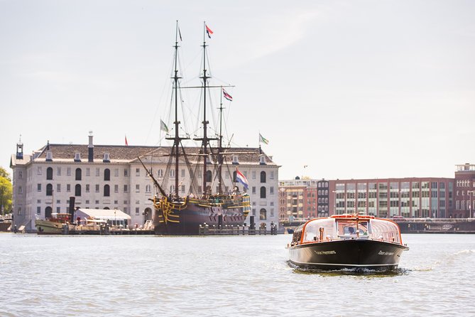 Madame Tussauds Amsterdam & 1-Hour Canal Cruise - The 1-hour canal cruise: bridges, churches, and cobblestones from water level