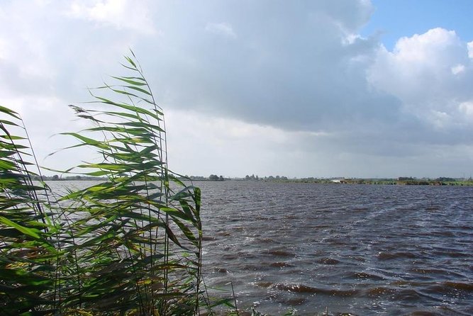 Off the beaten paths Dutch Country Side Private Tour in Jaguar - Volendam and Edam: fishing village charm and cheese-town identity