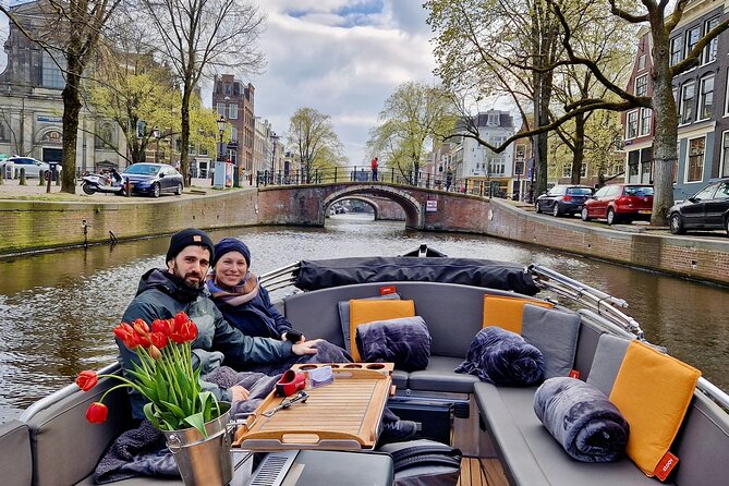 Private 90 Minute Amsterdam Canal Belt Exploration Cruise - Getting comfortable on an open boat: dress for wind and spray
