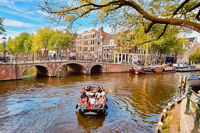 Private 90 Minute Amsterdam Canal Belt Exploration Cruise - From the Amstel River to dancing houses, the best photo moments start early