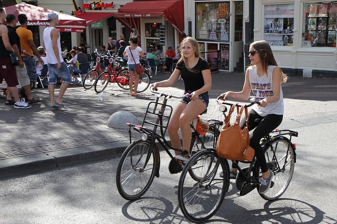 Private Amsterdam City Highlights Bike Tour (PRIVATE GUIDE) - Stop 1 Amsterdam, on the move and learning as you go