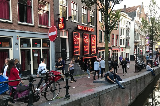 Private Amsterdam Red Light District and Coffee Shop Tour - Amsterdam’s smallest house and the VOC storage-to-home link