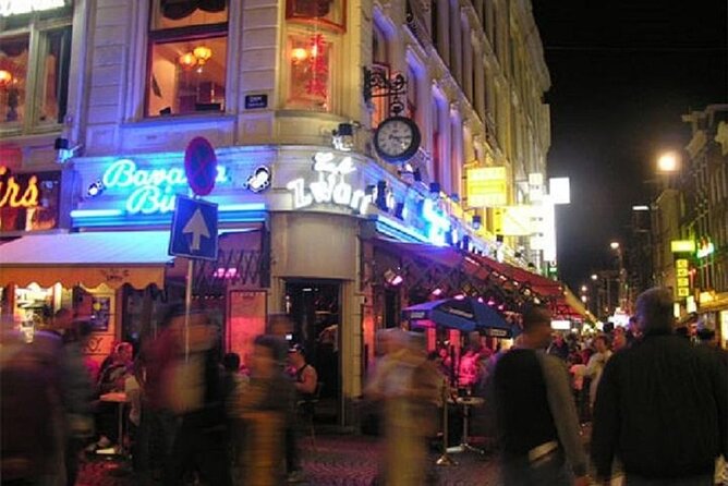 Private Amsterdam Red Light District and Coffee Shop Tour - How the guide explains laws around prostitution and marijuana tolerance