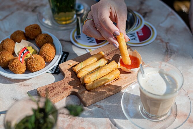 Private Amsterdam Red Light District and Food Tour (TOP RATED) - Stop 1: Amsterdam Centraal as your orientation point