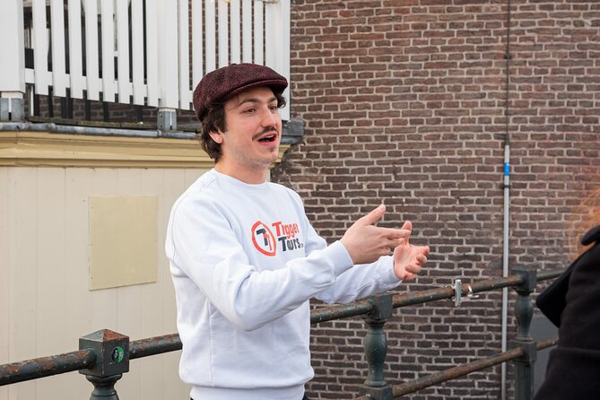 Private Amsterdam Red Light District and Food Tour (TOP RATED) - Offbeat Old Town stops: condom shop, smallest house, and Pub The Ape
