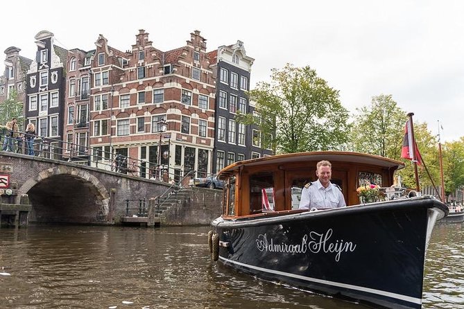 Private boat tour on a electric saloon boat - Private electric canal cruise on Amsterdam’s UNESCO Canal Ring