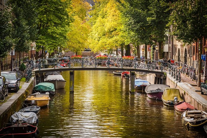 Private departure transfer from Amsterdam to Schiphol Airport (AMS) - Your Pickup Outside Amsterdam, Not at the Train Station