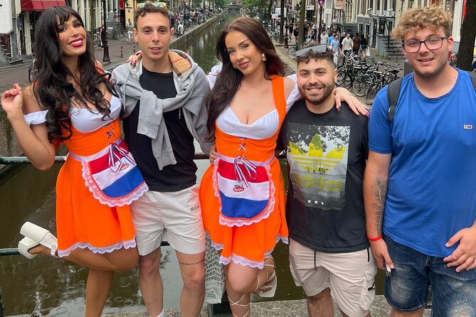 Private Hostess Bar Tour in Amsterdam Red Light District (3h) - De Wallen’s four-bar crawl: free shots, games, and bar-show energy